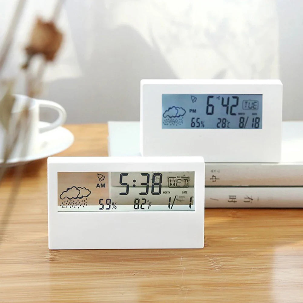 Wyświetlacz LCD budzika pokazujący godzinę, temperaturę i wilgotność